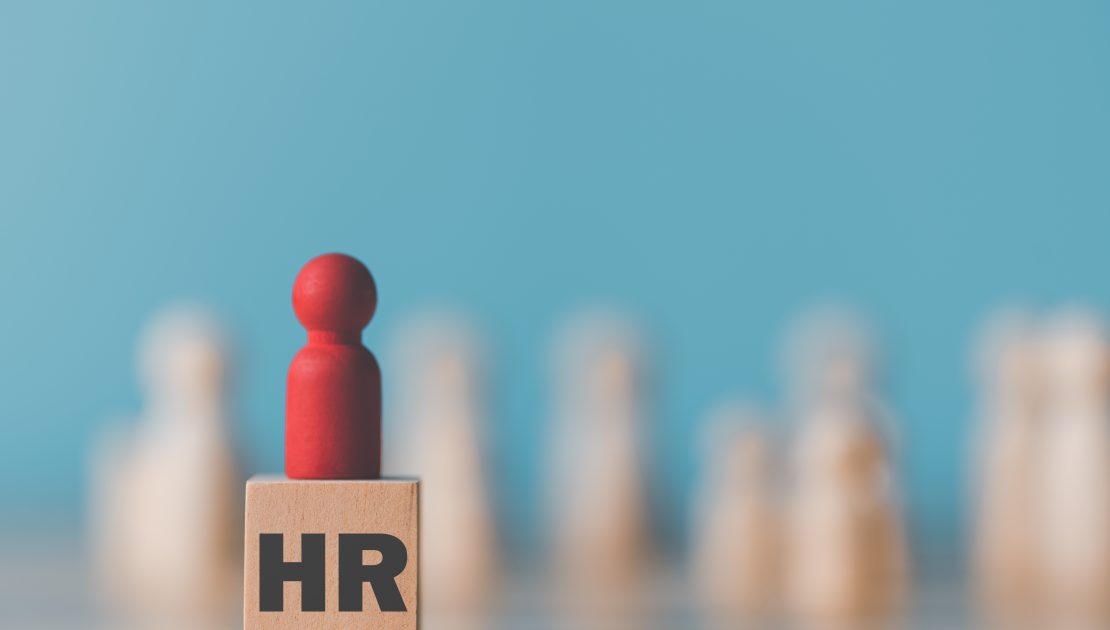 wooden doll is placed wooden blockhrm human resource managementleadership r